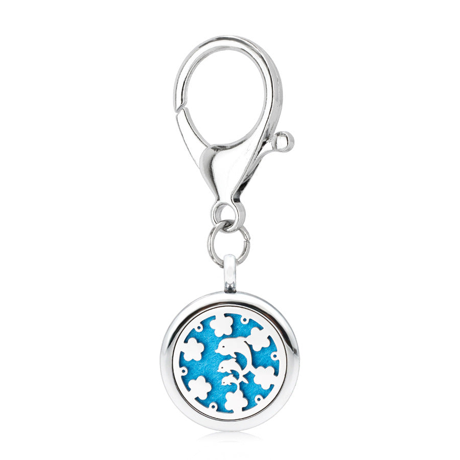 Wholesale 25MM Alloy Hollow New Flower Wings Aromatherapy Essential Oil Keychain